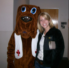 student and Red Cross dog mascot